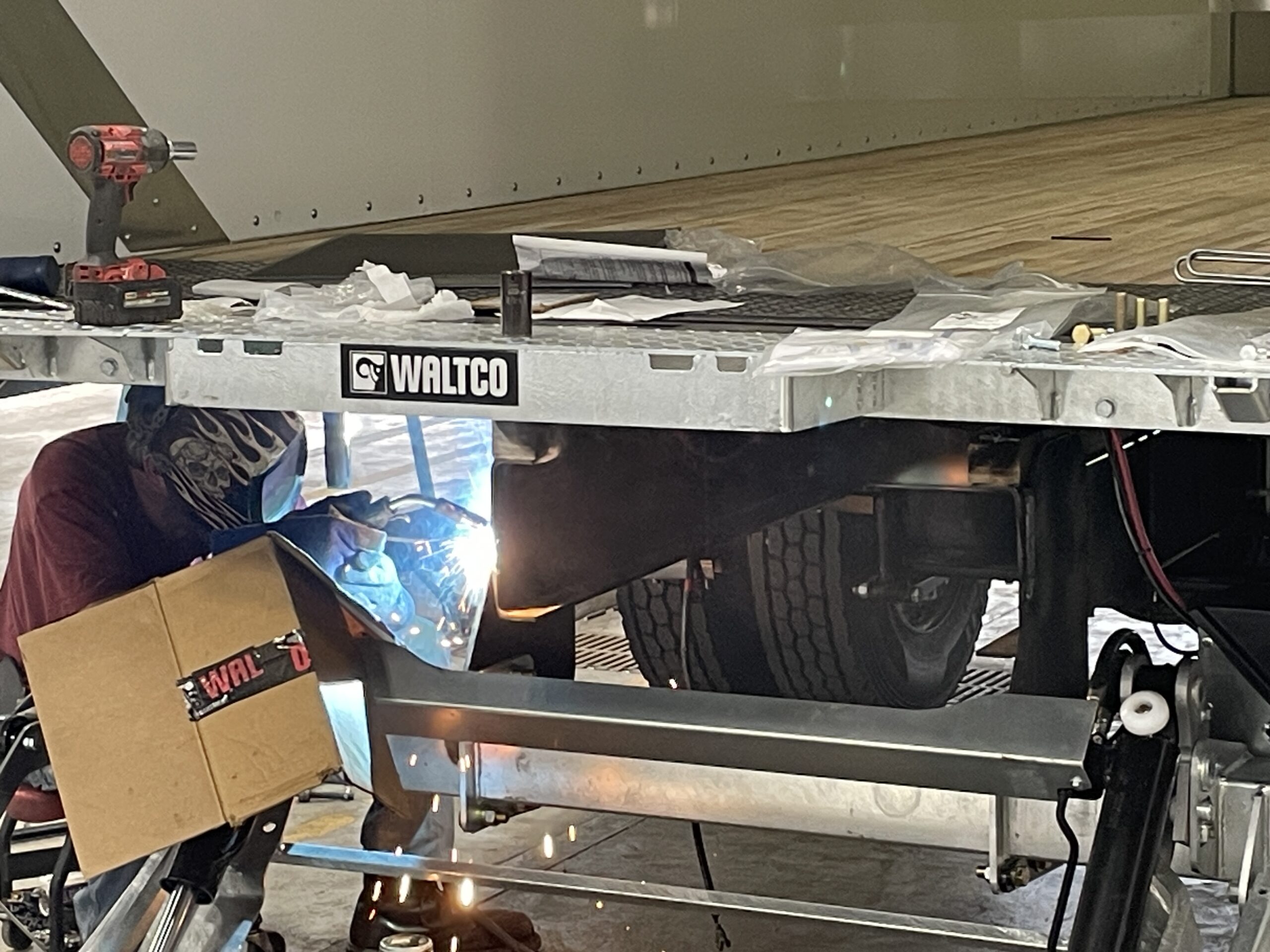 Waltco Liftgate being welded onto a Wabash truck body 2